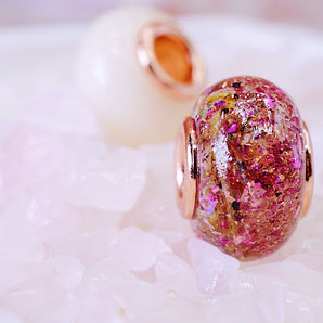 Bead with umbilical cord on pink 