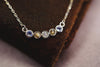 Scattered stone keepsake necklace in solid 14k gold
