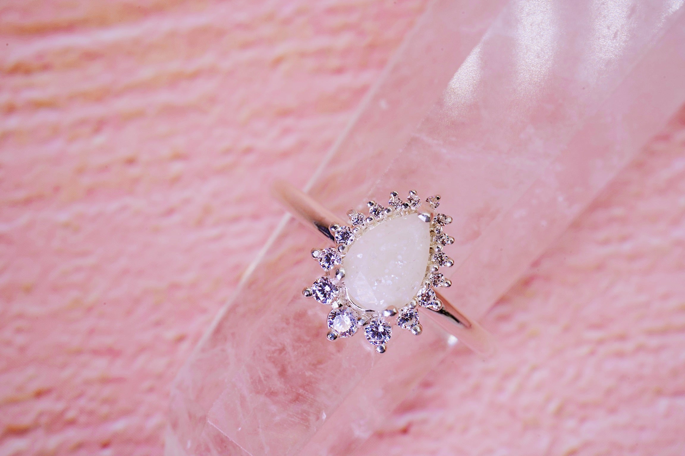 breastmilk ring centre with genuine white diamonds in pear shape 