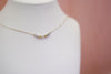 Scattered stone keepsake necklace in solid 14k gold