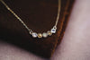 Scattered stone keepsake necklace in solid 14k gold