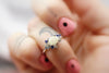 Camellia keepsake ring with custom gemstones in sterling silver