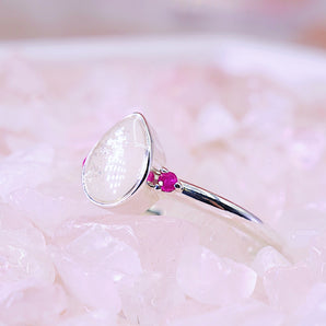 Pear shape ring with breastmilk stone and pink rubies 