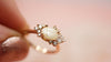 Camellia keepsake ring with custom gemstones in gold