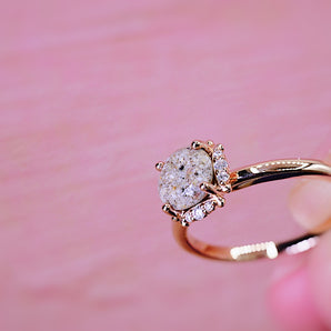 Solid gold memorial ashes ring surrounded by diamonds 