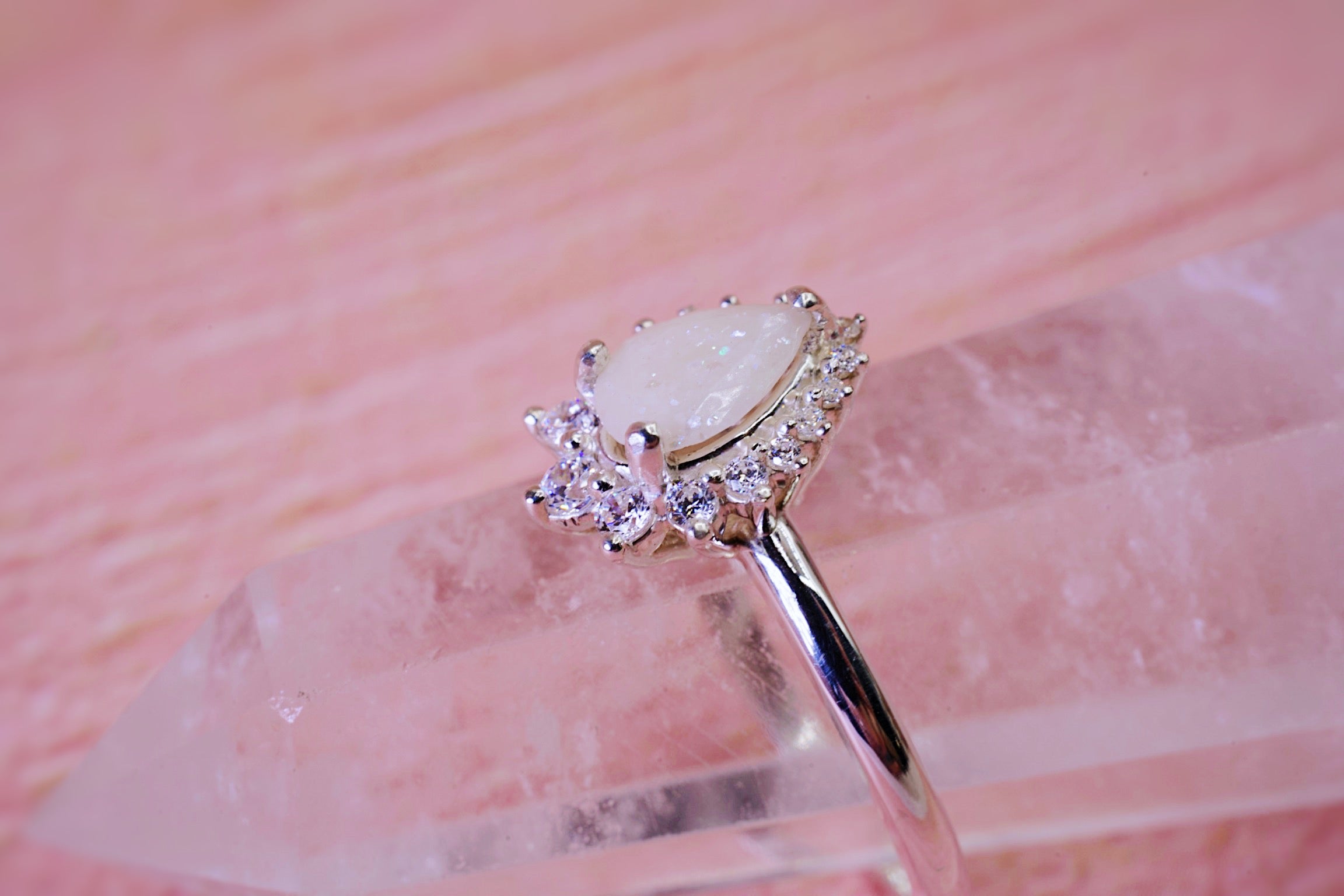 breastmilk ring centre with genuine white diamonds in pear shape 