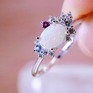 Camellia keepsake ring with custom gemstones in sterling silver
