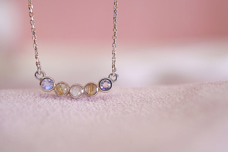 Scattered stone keepsake necklace in solid 14k gold