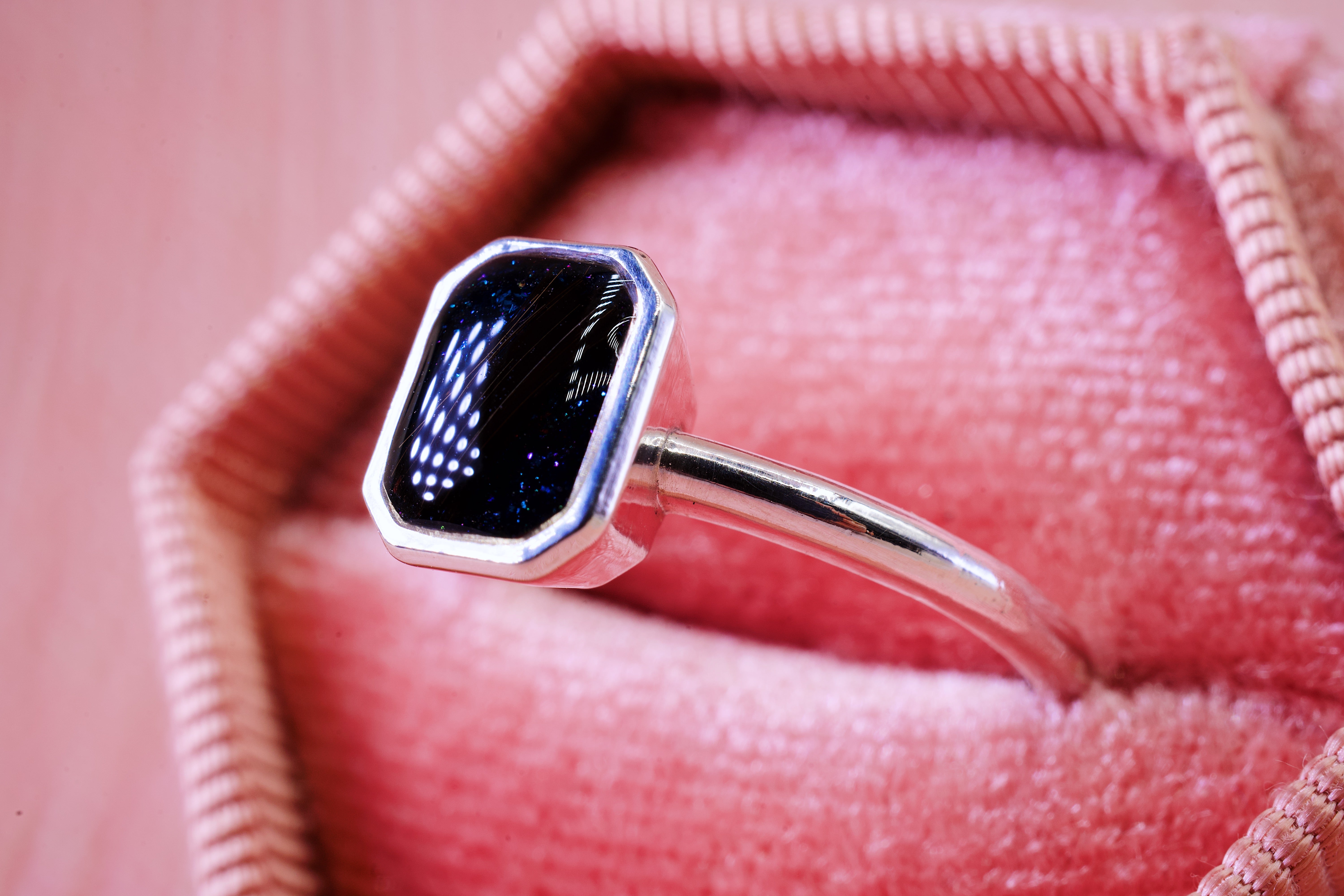 hair set into a sterling silver ring worn as a keepsake