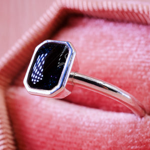 hair set into a sterling silver ring worn as a keepsake