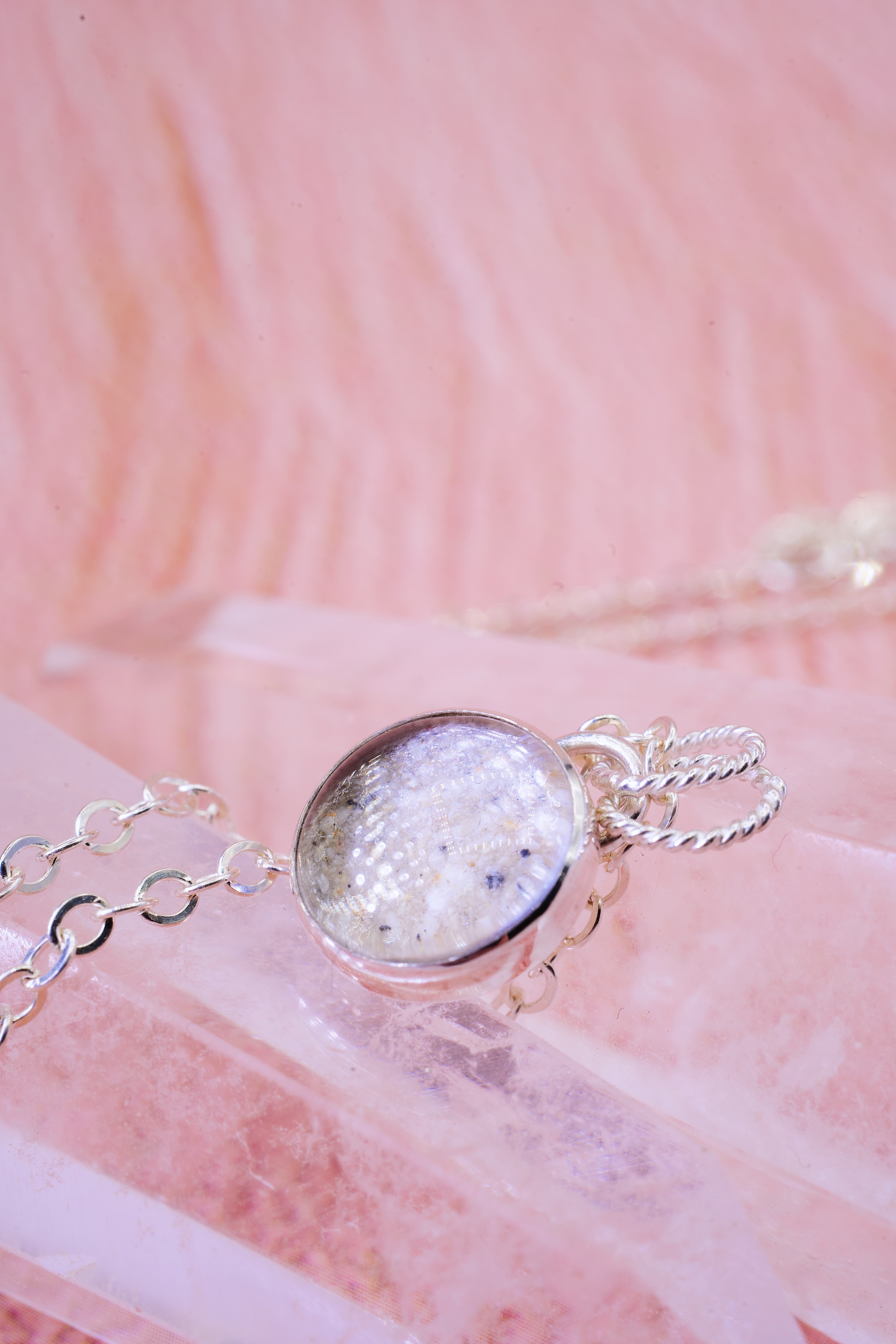 sterling silver pendant with an ashes stone and glass