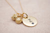 engraved disk with breast milk charm on chain