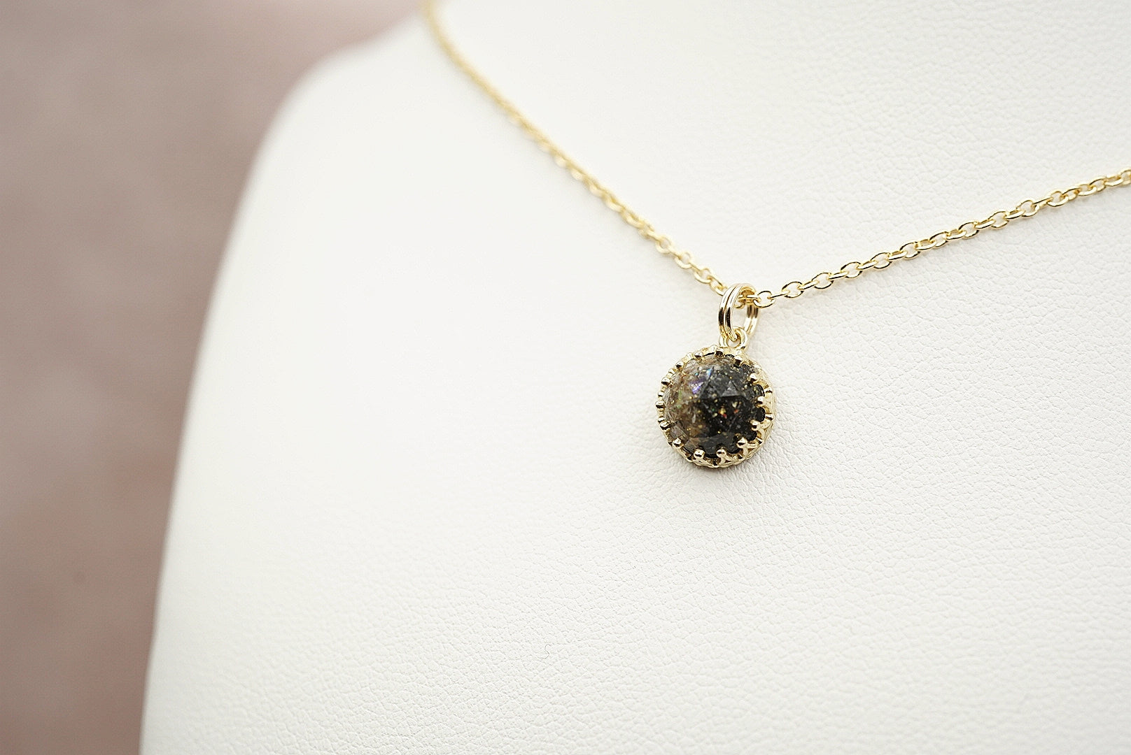 Solid gold pendant with cremation ash stone