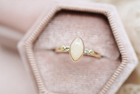 breast milk ring in solid gold and genuine gemstones