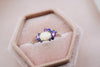 Camellia keepsake ring with custom gemstones in gold